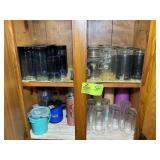 TWO SHELVES IN CABINET LEFT OF STOVE, MISC DRINKIN