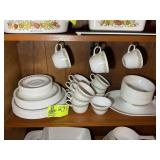 GROUP OF CORELLE DINNERWARE, GREEN FLORAL PATTERN,