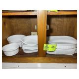 BOTTOM SHELF OVER STOVE, PYREX BAKING DISHES