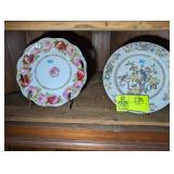 BOTTOM SHELF OF CORNER CABINET DECORATIVE PLATES O