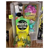 TOTE WITH MISC GARDENING SUPPLIES, ROSE FOOD, MIRA