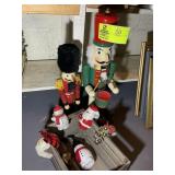 TWO NUTCRACKERS 18 IN AND 24 IN TALL, AND WOODEN C