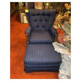 WOOD FRAMED UPHOLSTERED CHAIR AND OTTOMAN