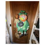 GROUP OF DECORATIVE ITEMS ON BACK OF CLOSET DOOR,
