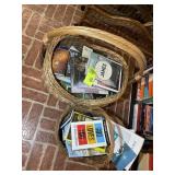 TWO WICKER BASKETS WITH CONTENTS, RELIGIOUS THEMED