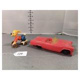 Vintage Plastic Dog on wheels and Red Car