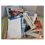Ford repair books and vintage calendars