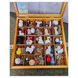 Vintage Avon bottles in display case