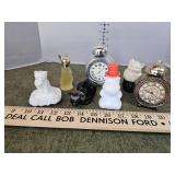 Avon bottles, cats clocks and wild animals