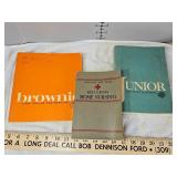 Vintage Girl Scout handbooks and Red Cross Nursing