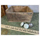 old wooden box and antique door knobs