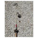 Open face fishing reel and a fishing rod