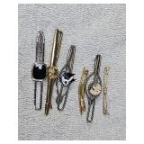 Antique men's tie clips