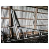 Swinging gate with clamps and poles