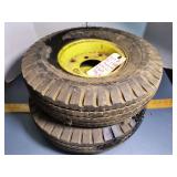 Set of 2 goodyear tires on 4 bolt John Deere rims