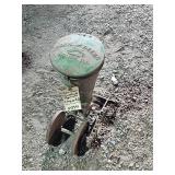 John Deere applicator with embossed lid