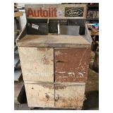 Vintage shop advertising Autolite cabinet