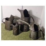 Collection of vintage metal oil cans