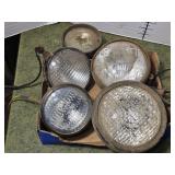 Collection of vintage tractor lights