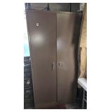 large metal cabinet w/ contents