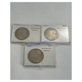 Three 1971 Eisenhower dollars in cases