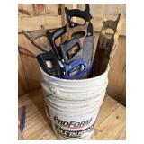 Assorted hand saws with Bucket
