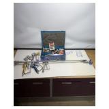 Spray guns and spray parts