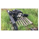 LOWE hydraulic post hole auger