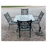 Cast Aluminum Outdoor Dining Set with Table, Four Chairs, and Umbrella Stand