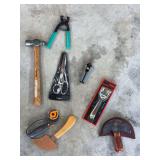 Assorted Hand Tools including Hammer, Scissors, and Rotary Cutters