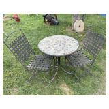 Outdoor stone top patio table w/ 2 metal folding