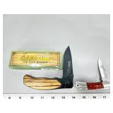 (2) pocket knives NRA and Cabelaï¿½s 10 year club