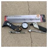 Air chucks tire pressure testers