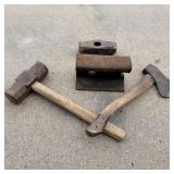 Vintage sledgehammers hatchet and railroad tie