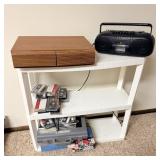 Plastic shelving unit with cassette tapes and