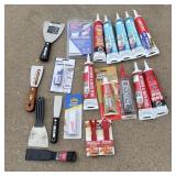 New caulk Loctite Quik seal putty knives and