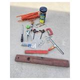 Tub of bungee cords, extension cord, C clamps,