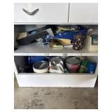 Contents of cupboards painting supplies and paint