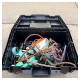 Tub of ratchet straps and bungee cords