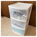 Plastic storage drawers filled with medical