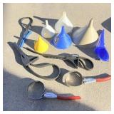 Large lot of funnels and oil wrenches