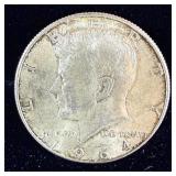 uncirculated 1964 silver Kennedy half dollar