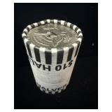 Roll of Kennedy half dollars