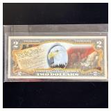 Colorized we the people two dollar bank note