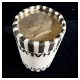 Roll of Kennedy half dollars search for silver!