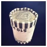 Roll of Kennedy half dollars search for silver