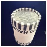 Roll of Kennedy half dollars search for silver