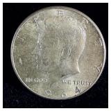 Uncirculated 1964 silver Kennedy half dollar
