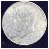 Bright uncirculated 1964 silver Kennedy half
