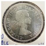 Bright uncirculated 1964 silver Canadian dollar